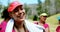 Portrait of female trainer standing with towel around her neck