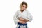 Portrait of female wearing martial arts uniform making belly pain gesture