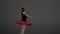 Portrait of female on white background in studio under spotlight. Close up shot ballerina in red tutu and body dancing