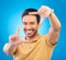 Portrait, finger frame and man in studio, blue background and review profile picture. Face, happy asian model and hands