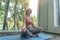 Portrait of fit white healthy woman, caucasian person meditating in yoga room, Yoga concept. Lifestyle. Calm meditation