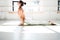 Portrait of fit young woman practicing yoga indoor white class. Handsome girl practice cobra asana in sunny gym