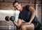 Portrait, fitness and dumbbell with a sports man training in a gym for strong or healthy muscles. Happy. exercise and