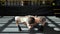 Portrait of a fitness person doing push-ups in the gym of a boxing club