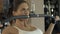 Portrait fitness woman training muscle on modern sports equipment in gym club