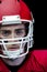 Portrait of focused american football player wearing his helmet