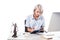 portrait of focused lawyer working at workplace with cup of coffee and notebooks