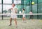 Portrait of focused woman during padel training