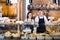 Portrait of friendly couple at bakery display