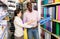 Portrait of friendly female shop assistant at stationery store