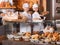 Portrait of friendly smiling women at bakery display