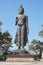 Portrait Front Buddha Pacifying Relatives Statue on Blue Sky Background