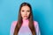 Portrait of frustrated disappointed girl grimace face wear pullover isolated over blue color background
