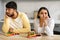 Portrait of frustrated young indian man and woman have quarrel