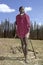 Portrait, full length red carpet, of Maasai teen