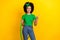 Portrait of funky teenager schoolgirl hold hula hoop circle indicate finger empty space isolated on yellow color