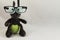 Portrait of funny cute plush firefly wearing eyeglasses isolated