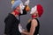 Portrait of funny mime couple with white faces and