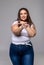 Portrait of funny plus size women with long hair in white t-shir