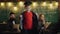 Portrait of funny schoolboy with graduation hat in classroom. Preschool with parents. Teachers and pupil in class. Cute