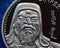 The portrait of genghis khan on a mongolian silver coin