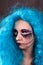 Portrait of girl with makeup scary dolls and blue hair