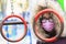 Portrait of a girl in a medical mask and glasses on a children `s sports playground