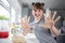 Portrait Of Girl With Messy Hands Having Fun In Kitchen At Making Pastry For Baking