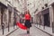 Portrait of girl with red umbrella in Paris