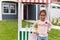 Portrait Of Girl Running Homemade Lemonade Stand