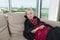 Portrait of girl in vampire costume relaxing on sofa at home