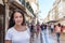 Portrait of a girl walking along the busy streets Augusta of Lisbon.