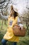 Portrait of girl wearing sun hat in yard