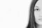 Portrait of a girl on a white background. Fragment of a portrait of a girl. Face close up. Black and white panoramic template with