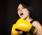 Portrait of a girl in yellow boxing gloves