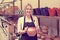 Portrait of glad woman pottery worker with ceramic crockery