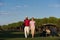 Portrait of golfers couple on golf course