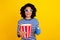 Portrait of good mood cheerful girl wear striped sweatshirt in 3d glasses hold popcorn soda at cinema isolated on yellow