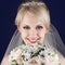 Portrait of gorgeous blonde bride with splendid shiny smile