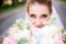 Portrait of a gorgeous bride with tender skin and deep blue eyes