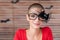 Portrait of a gorgeous young woman, a cancer patient, dressed up for halloween, looking at camera smiling.