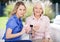 Portrait Of Granddaughter And Grandmother Playing