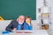 Portrait of grandfather and Son in classroom. Grandfather and son having fun together. Student and tutoring education