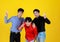 Portrait group of 3 adults asian men are friend and them are smiling and 2 fingers up look feel confident with smile on face.