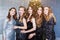 Portrait of a group of beautiful young women in the new year, Christmas