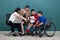 Portrait group of special kids classroom, disable and down syndrome boys, girl and teacher taking photo together with happiness
