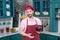 Portrait of Guy prepared fresh vegetables to cook. Bearded young guy in apron on kitchen