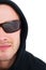 Portrait of hacker in hood with sunglasses
