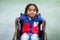 Portrait of handicapped boy in classroom