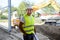 Portrait of handsome foreman construction worker on industrial building industry construction site